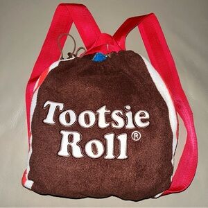 TOOTSIE ROLL BLANKET BLUE FLEECE rolled in attached brown backpack w red straps